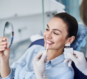 Patient consulting for dental veneers. Full set of veneers. 